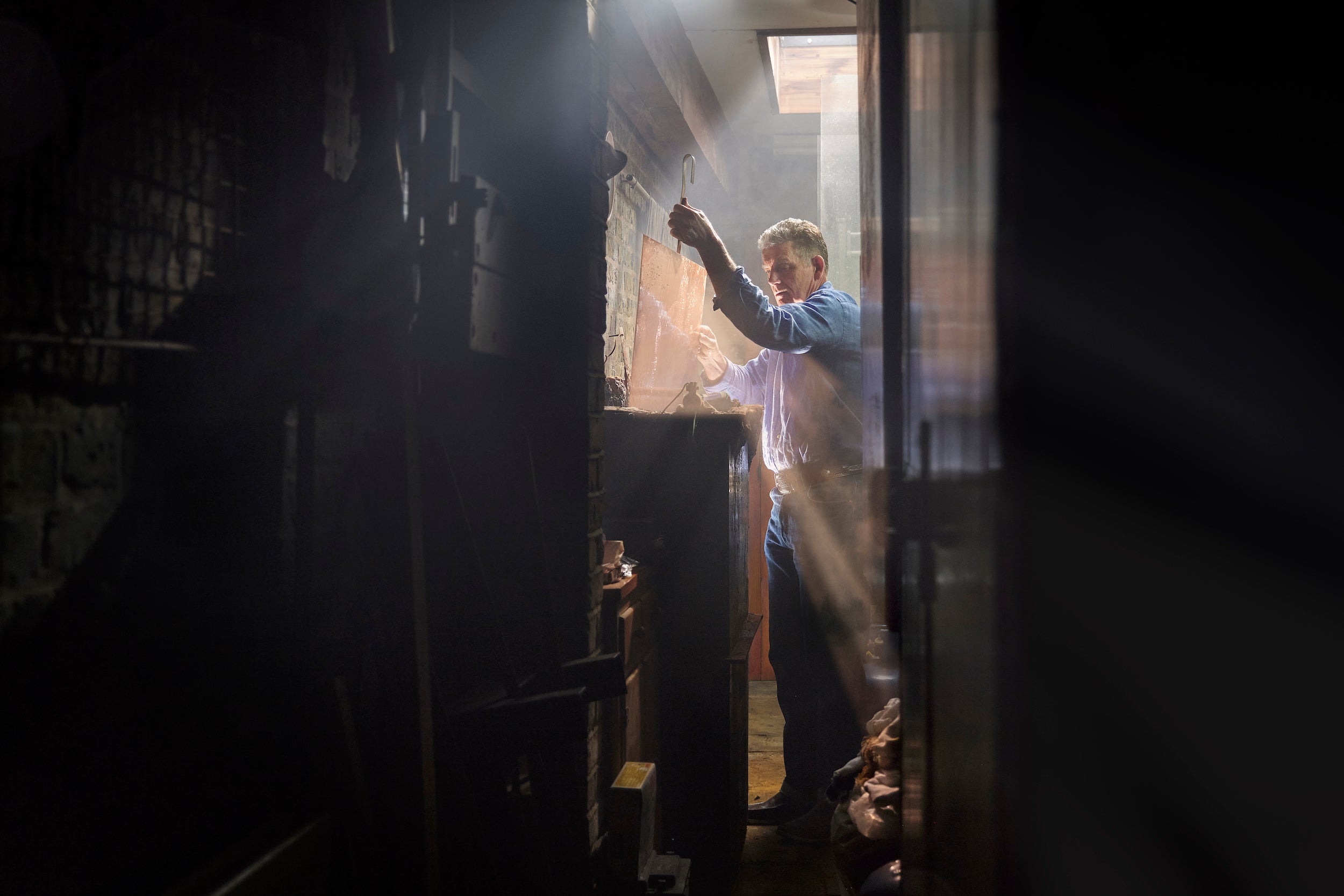 'Steel-Facing' from the artist's film 'Drypoint' depicting Richard at work in his studio